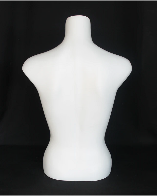 Headless female torso form in matte white