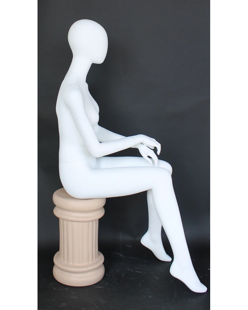 Hands-in-lap sitting egghead female mannequin in matte white