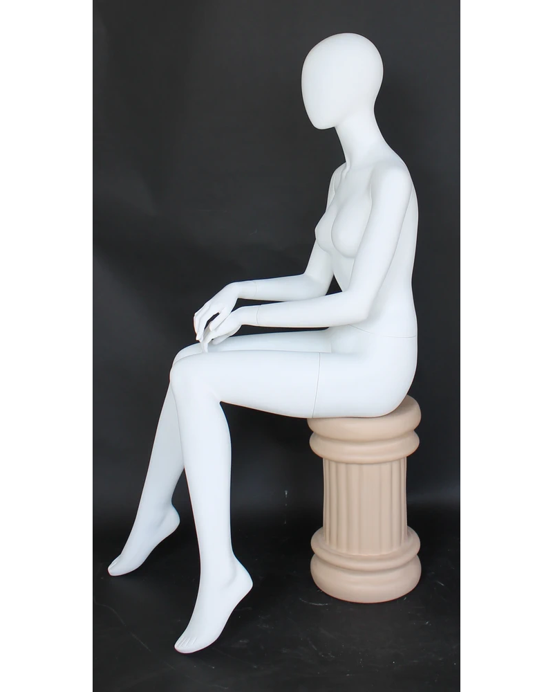 Hands-in-lap sitting egghead female mannequin in matte white