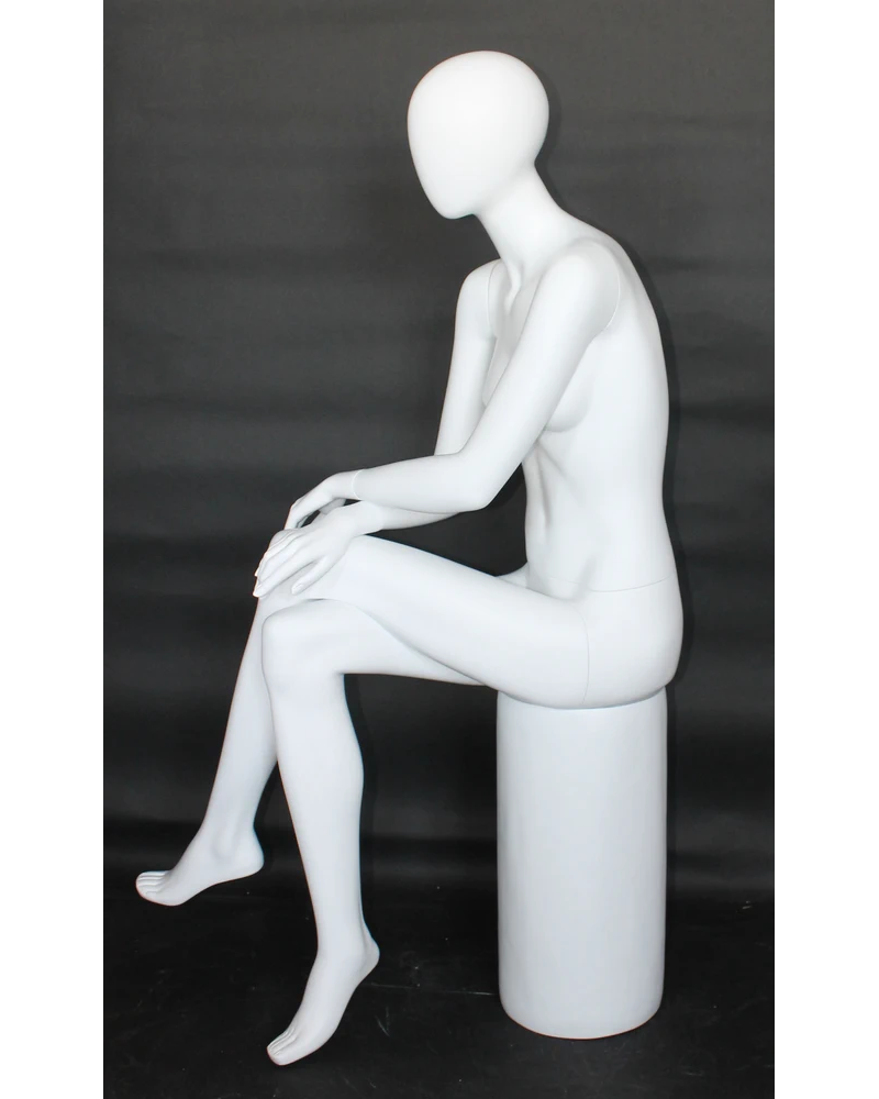 Crossed-leg sitting egghead female mannequin in matte white