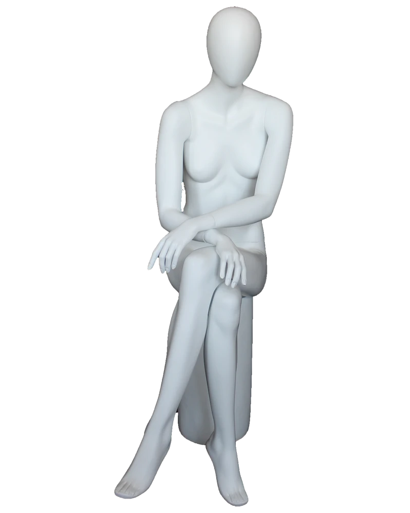 Crossed-leg sitting egghead female mannequin in matte white, front view