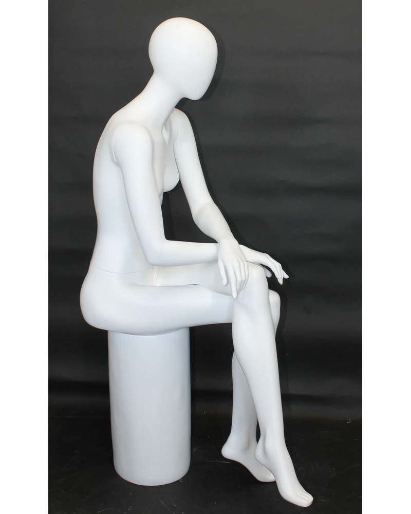 Crossed-leg sitting egghead female mannequin in matte white