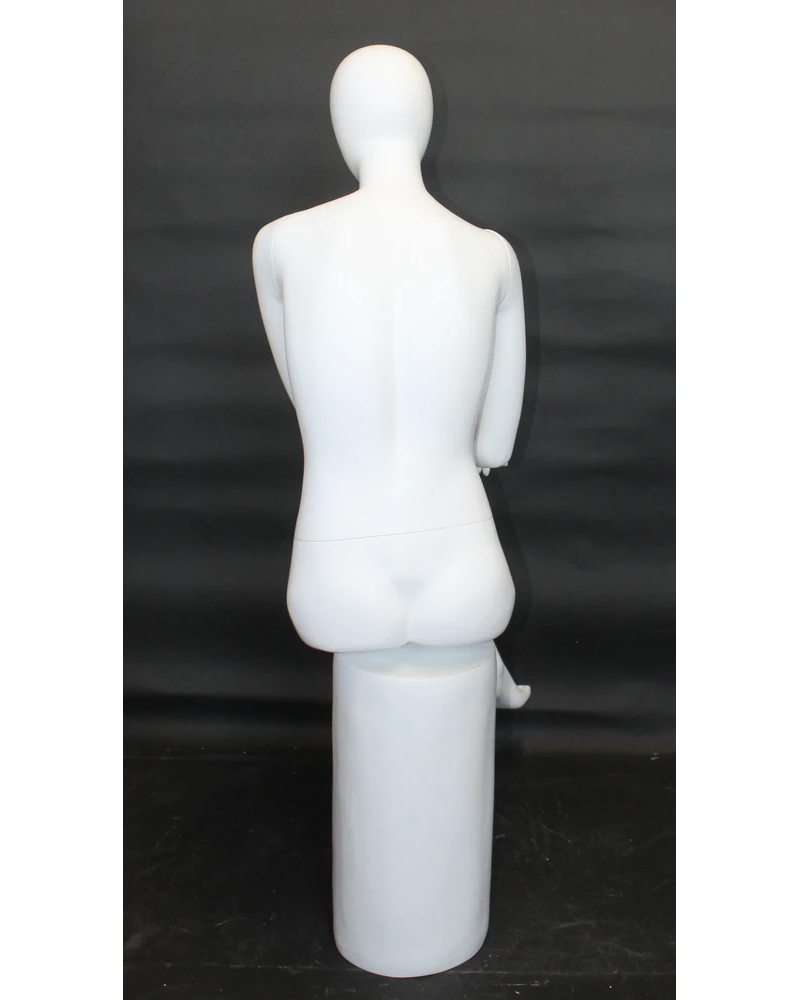 Crossed-leg sitting egghead female mannequin in matte white