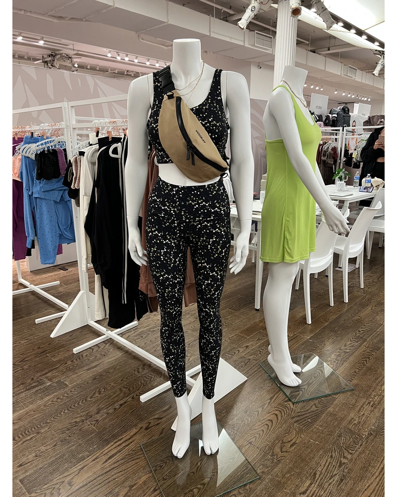Simple standing headless female mannequin in matte white