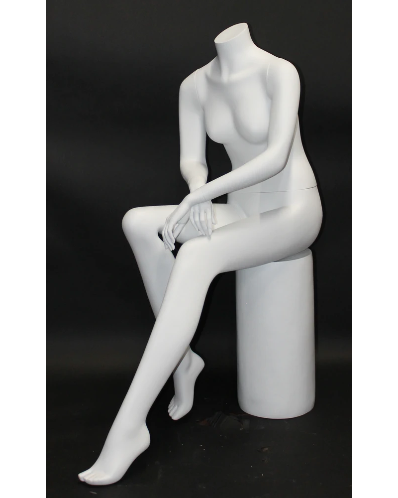 Seated headless female mannequin in matte white
